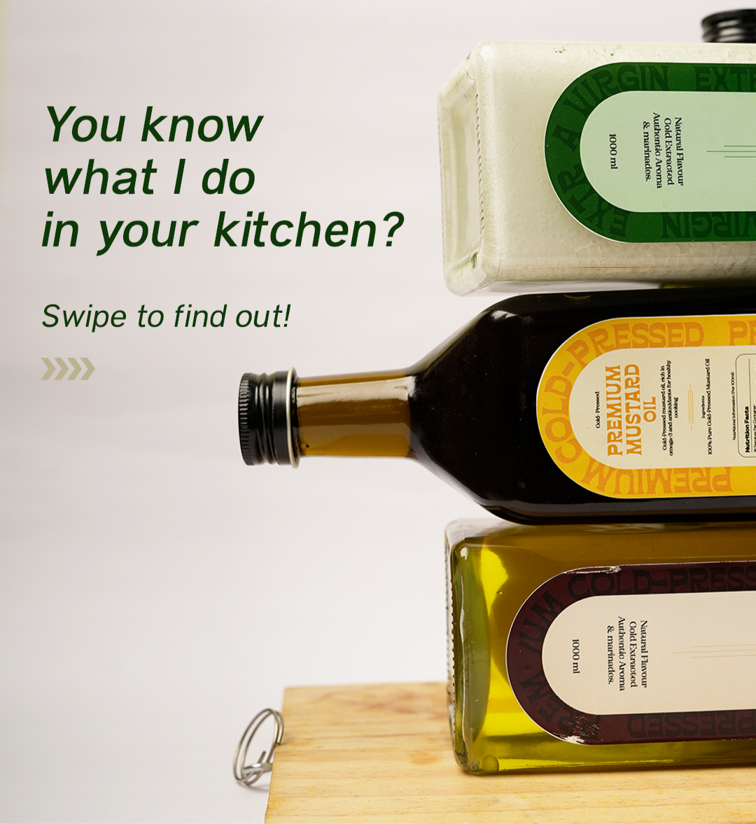 Bottles of olive oil and a container with &